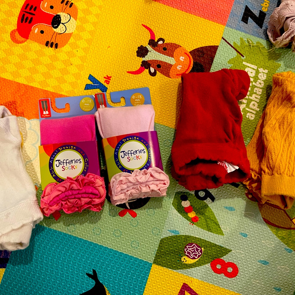 Jeffery socks tights unopened and mustard ruffle butt corded tights.